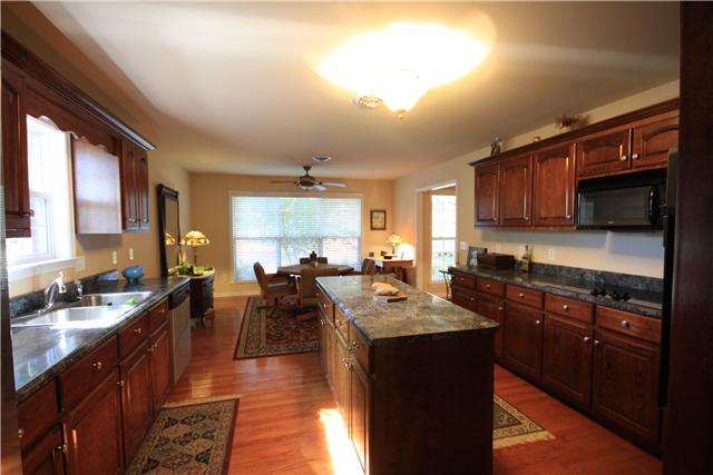 1137 Rip Steele Road Columbia, TN 38401 - Photo 5 of 20 Eating Area in Kitchen overlooking your private back yard. Beautiful Hardwood cabinets and Granite Countertops in Kitchen!