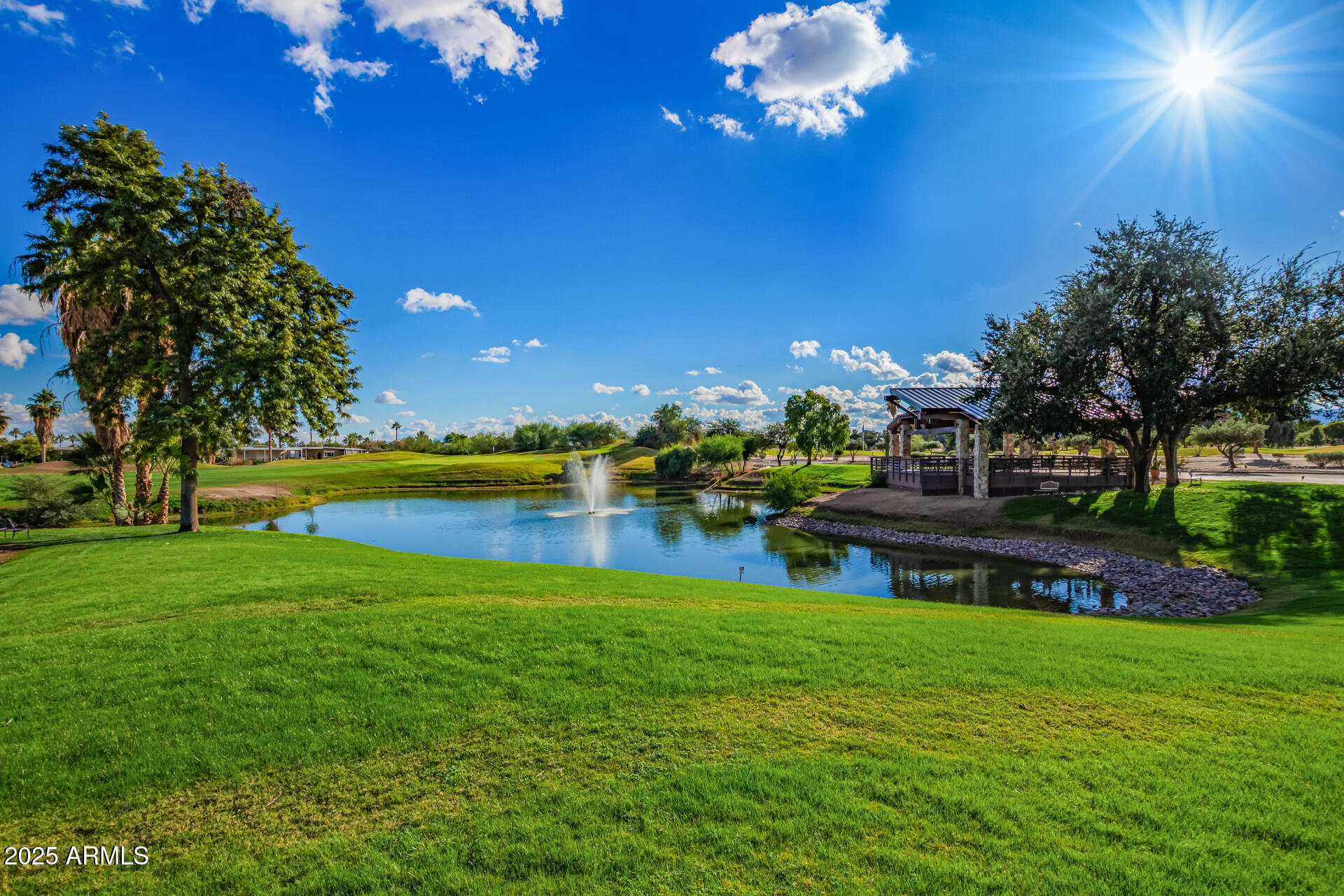 17200 West Bell Road, Unit 966 Surprise, AZ 85374 - Photo 15 of 21 a view of a house with a swimming pool