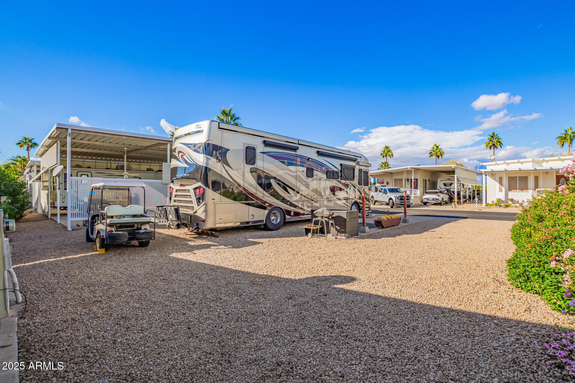 17200 West Bell Road, Unit 966 Surprise, AZ 85374 - Photo 6 of 21 a view of a building with cars parked