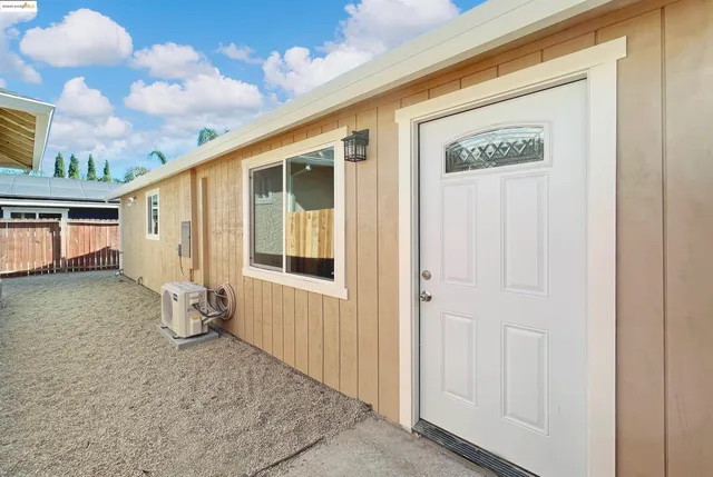 a view of an entryway with hardwood