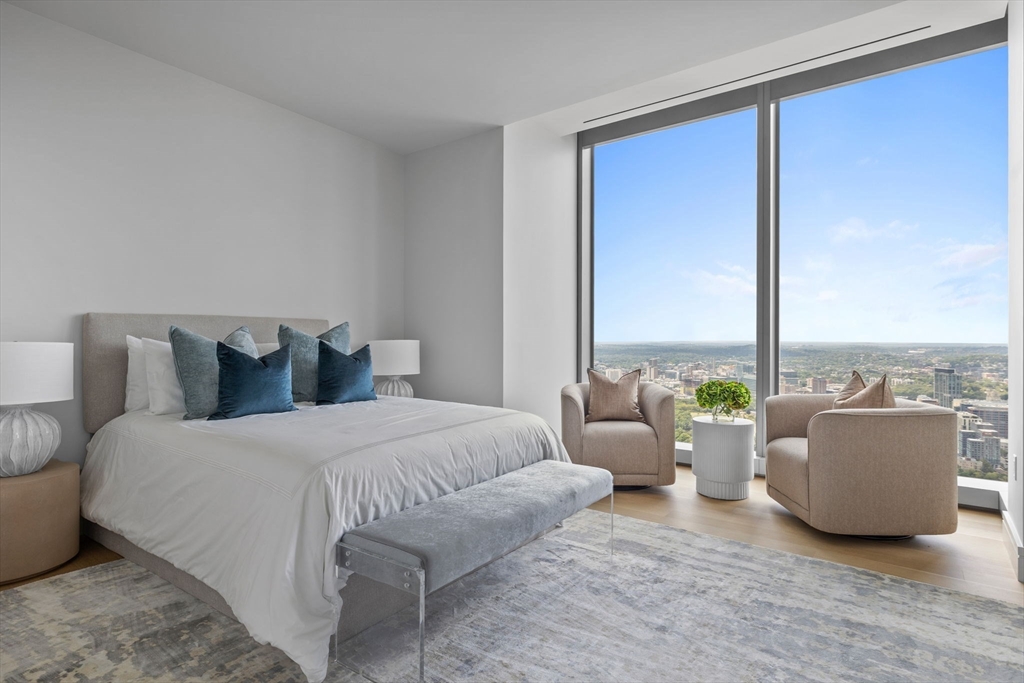 1 Dalton Street, Unit 5101 Boston, MA 02115 - Photo 16 of 31 a living room with furniture and large windows