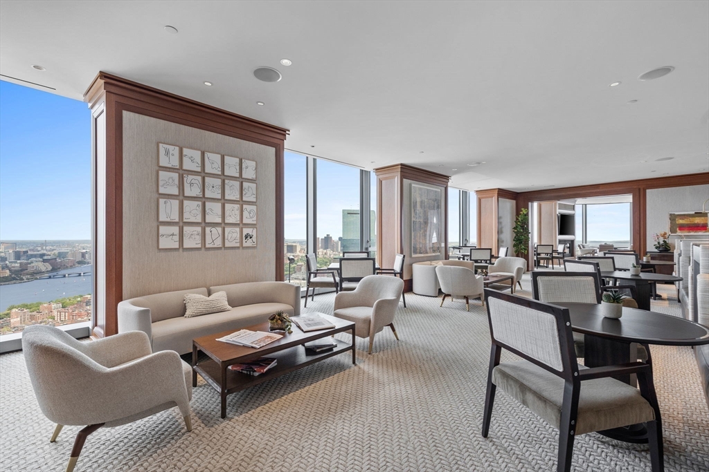 1 Dalton Street, Unit 5101 Boston, MA 02115 - Photo 22 of 31 a living room with furniture and a large window