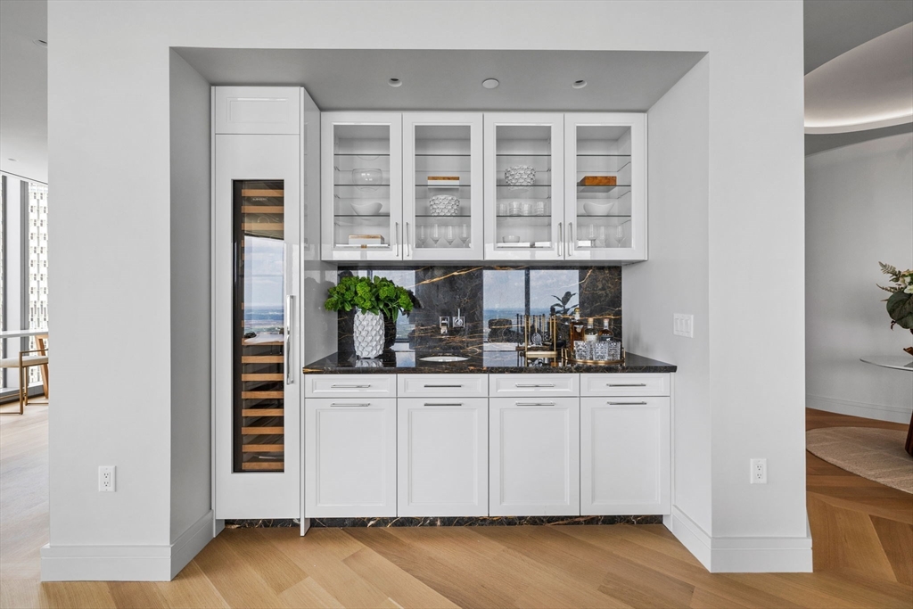 1 Dalton Street, Unit 5101 Boston, MA 02115 - Photo 7 of 31 a view of granite countertop cabinets and window