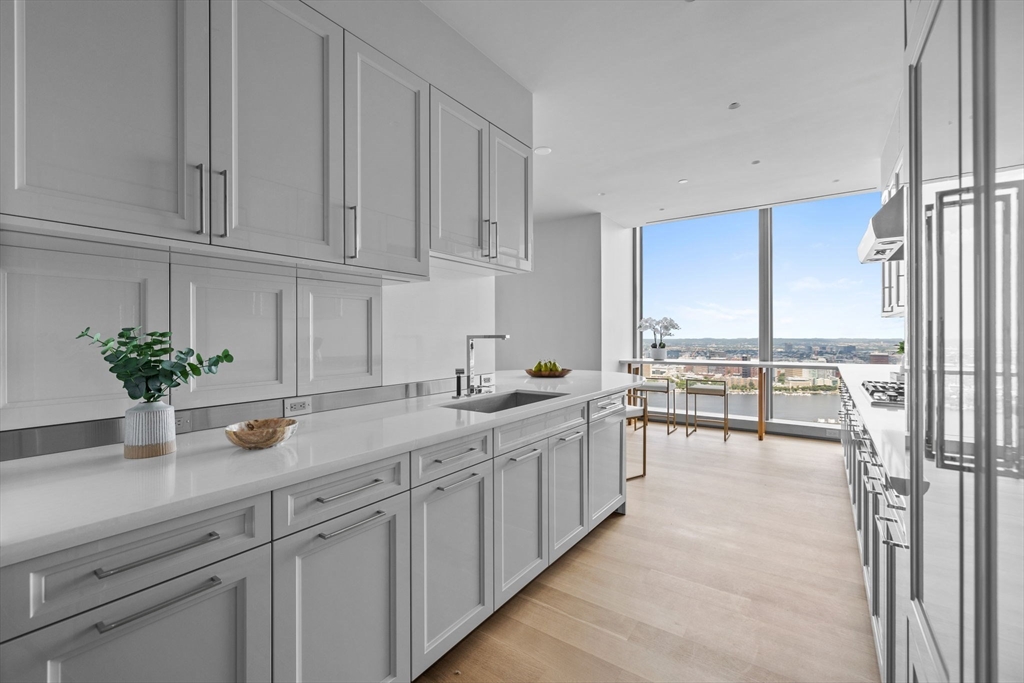 1 Dalton Street, Unit 5101 Boston, MA 02115 - Photo 10 of 31 a kitchen with a sink and cabinets