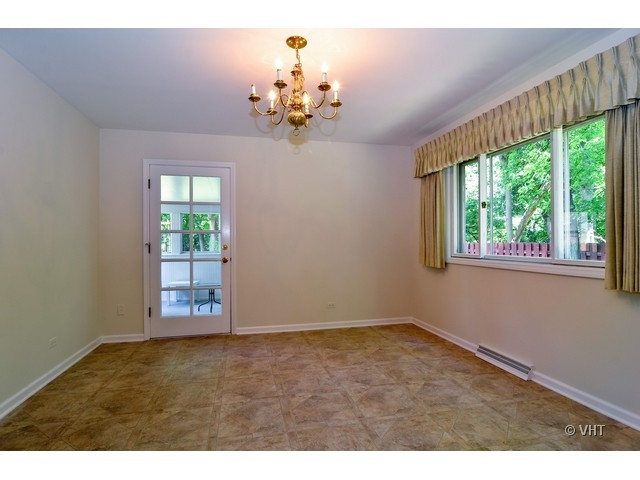 1205 Arbor Vitae Road Deerfield, IL 60015 - Photo 5 of 10 a view of an empty room with a window