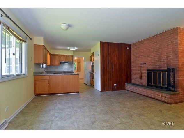 1205 Arbor Vitae Road Deerfield, IL 60015 - Photo 6 of 10 a view of kitchen with refrigerator and window