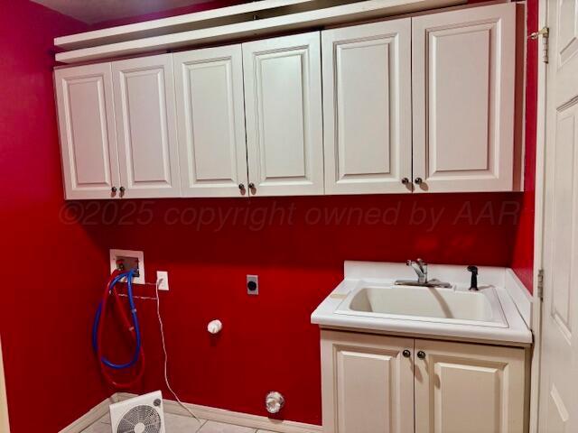 5813 Nicholas Circle Amarillo, TX 79109 - Photo 6 of 6 a bathroom with a sink and cabinets