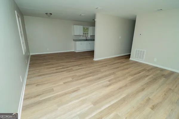a view of a tiny house with a yard