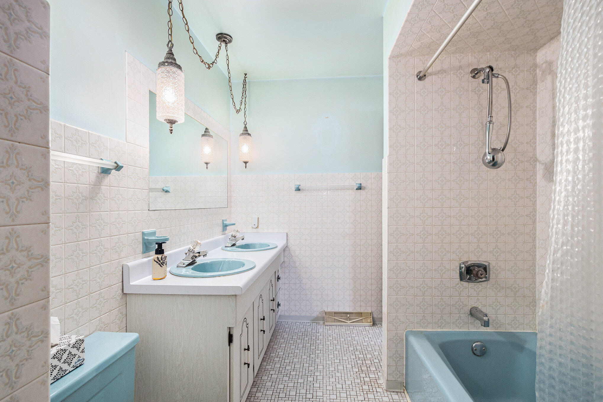 7905 Frederick Avenue Munster, IN 46321 - Photo 17 of 26 a bathroom with a sink a tub and shower