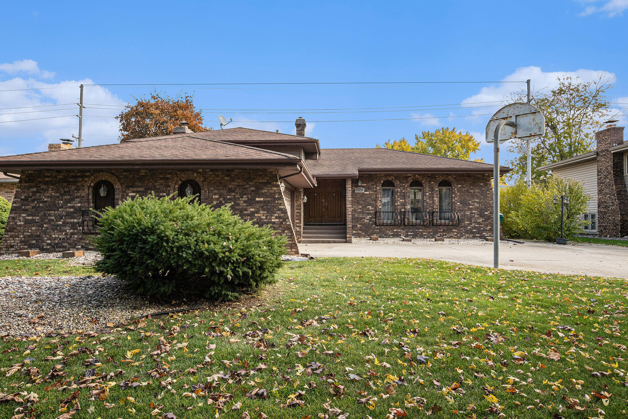 7905 Frederick Avenue Munster, IN 46321 - Photo 25 of 26 a front view of a house with a yard