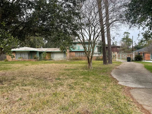 a house with trees in front of it