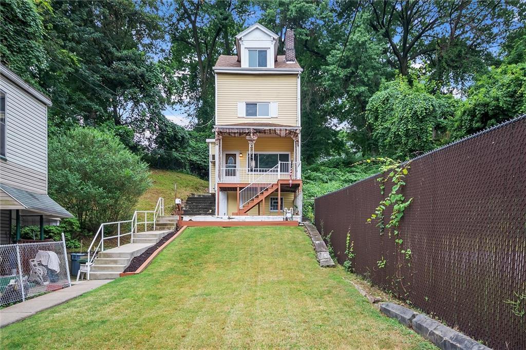 2133 Brighton Road Pittsburgh, PA 15212 - Photo 1 of 23 a view of a house with a yard and sitting area
