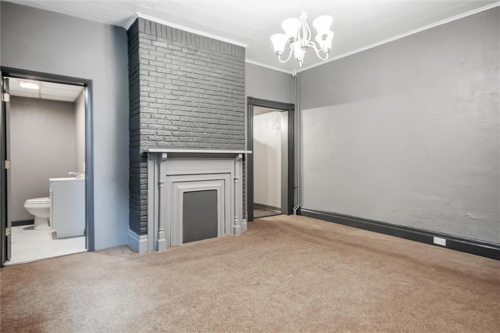 2133 Brighton Road Pittsburgh, PA 15212 - Photo 11 of 23 a view of a livingroom with a fireplace