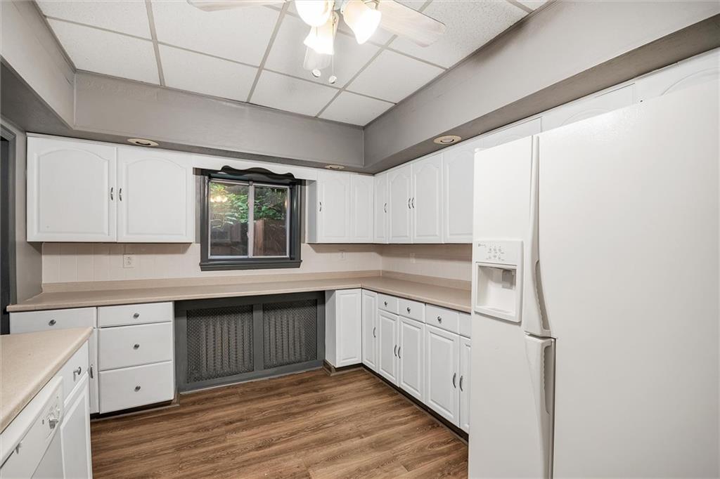 2133 Brighton Road Pittsburgh, PA 15212 - Photo 12 of 23 a kitchen with white cabinets and sink