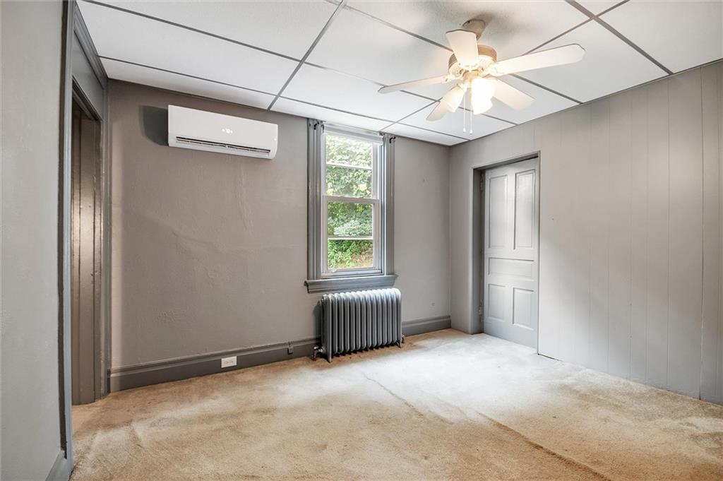2133 Brighton Road Pittsburgh, PA 15212 - Photo 18 of 23 a view of an empty room with a window