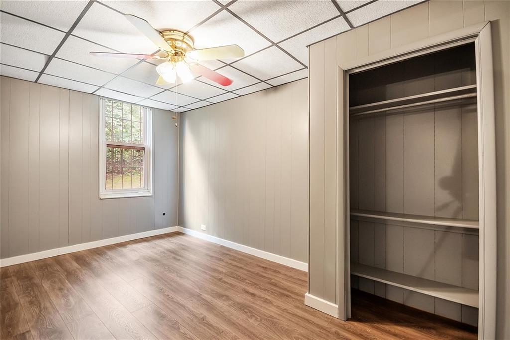2133 Brighton Road Pittsburgh, PA 15212 - Photo 21 of 23 a view of an empty room with wooden floor and a window