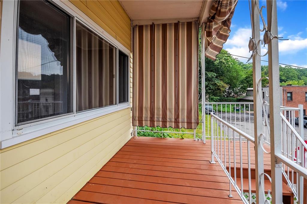 2133 Brighton Road Pittsburgh, PA 15212 - Photo 22 of 23 a balcony with view of outdoor space