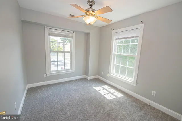 a view of room with cabinets