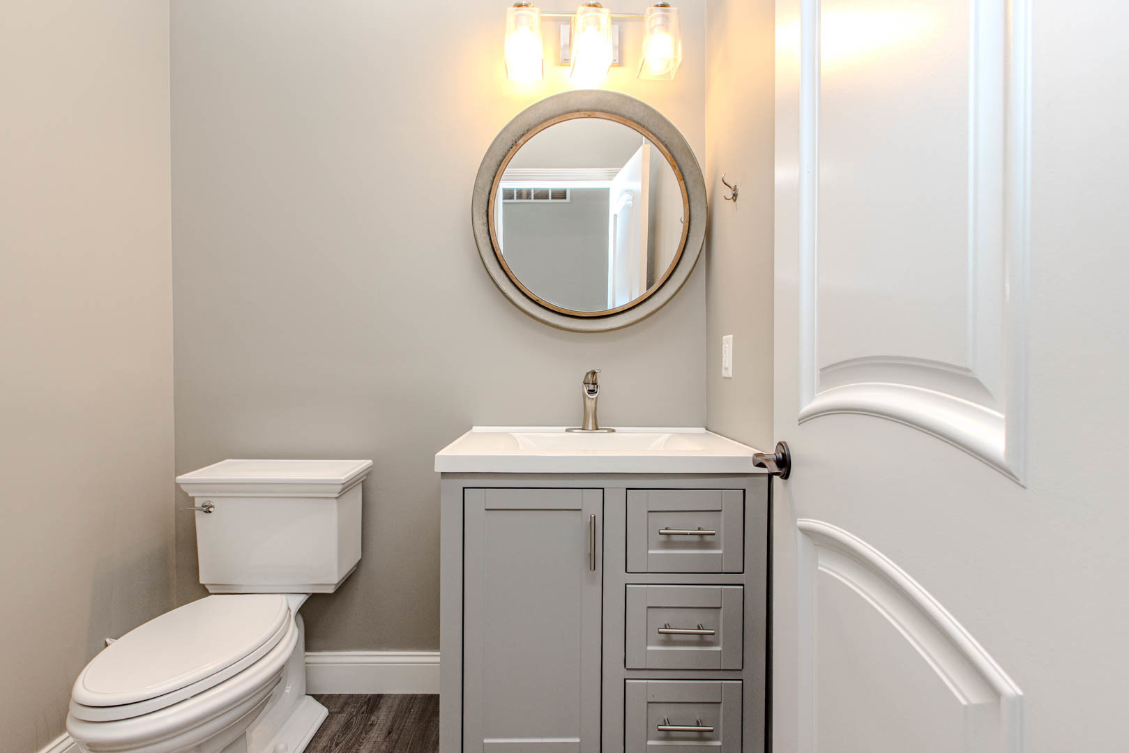 59 Stonebrook Court Bloomington, IL 61704 - Photo 20 of 52 a bathroom with a sink a toilet and a mirror