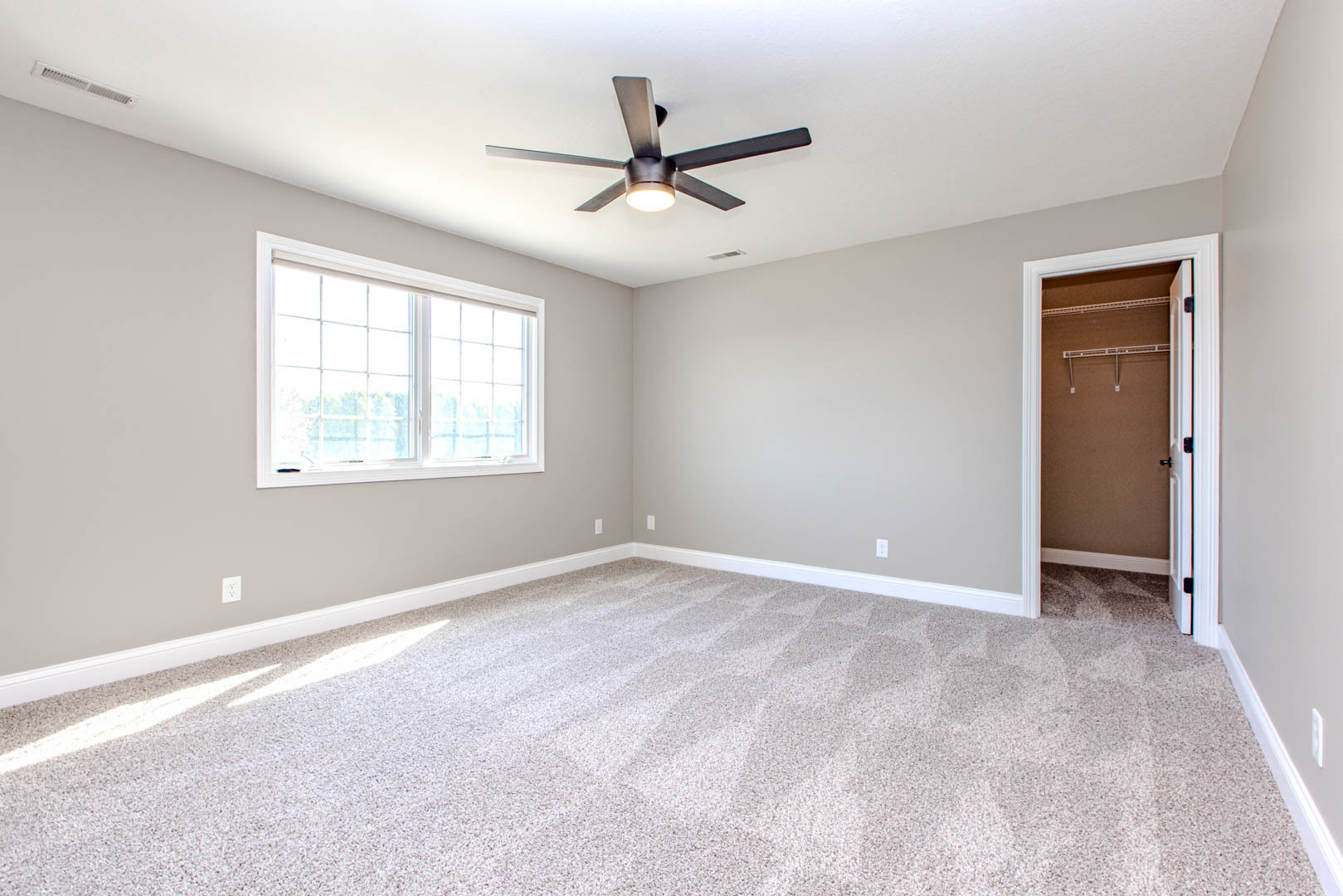 59 Stonebrook Court Bloomington, IL 61704 - Photo 30 of 52 a view of an empty room with a window