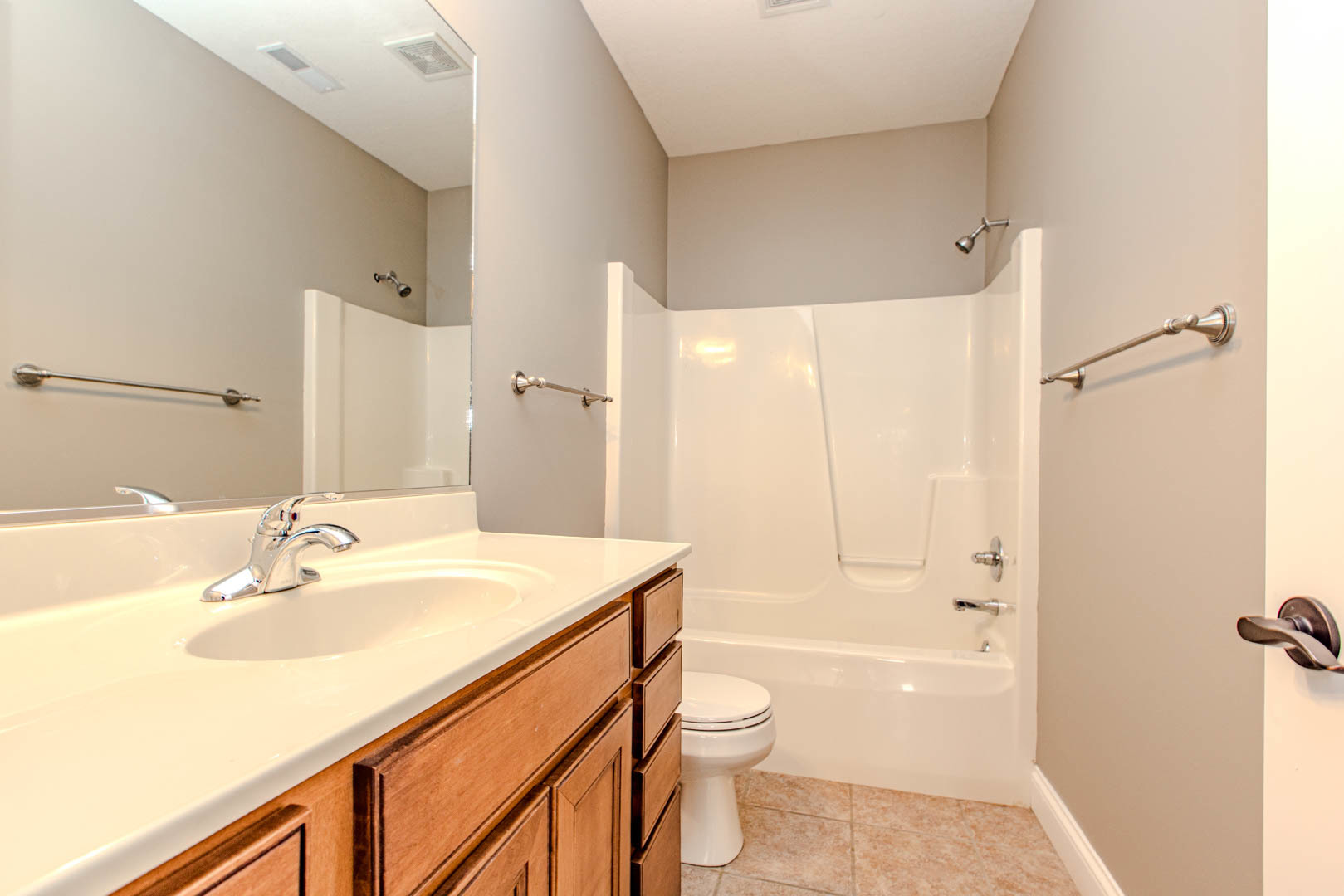59 Stonebrook Court Bloomington, IL 61704 - Photo 41 of 52 a bathroom with a sink a toilet and shower