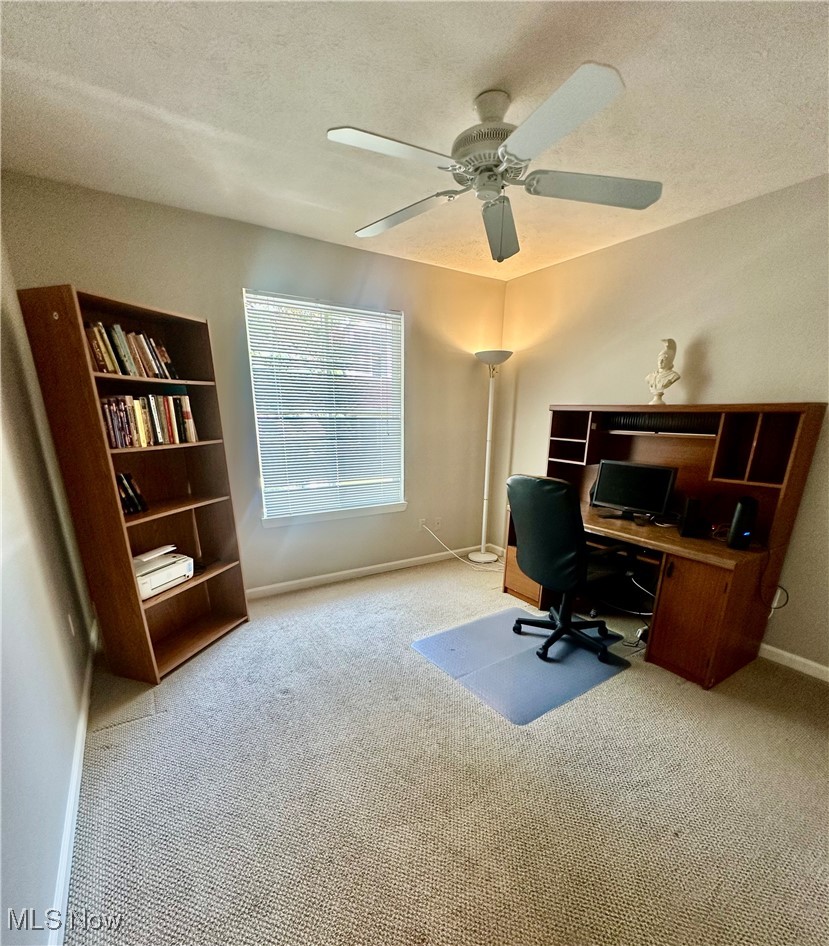 4212 Castle Ridge Akron, OH 44321 - Photo 22 of 44 Carpeted home office with a textured ceiling and a ceiling fan