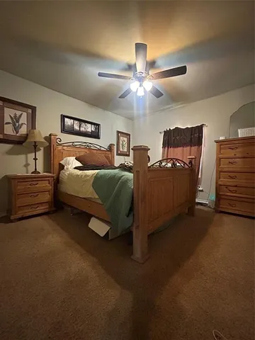 a bathroom with a double vanity sink mirror and shower