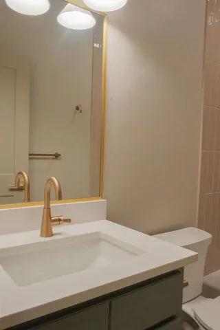 a bathroom with a toilet and a bathtub