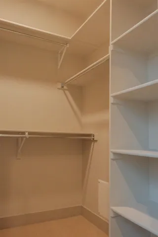 a bathroom with a sink vanity and a mirror