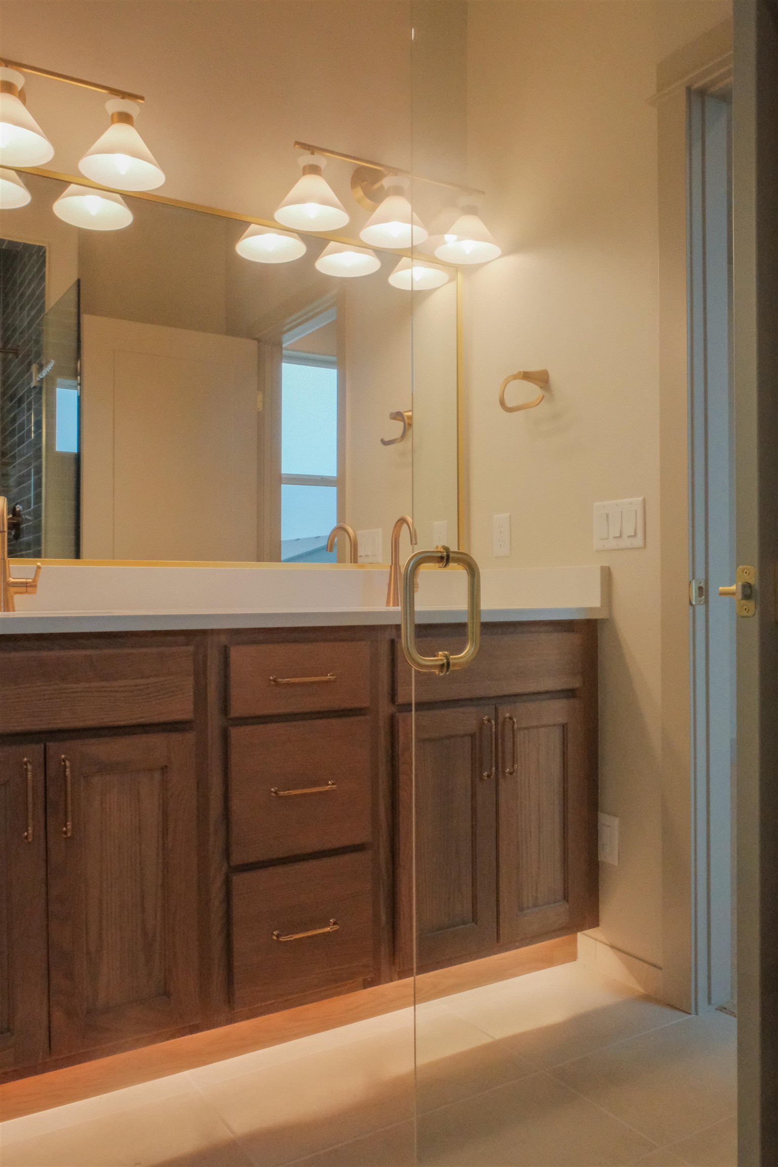 961 Urique Lane Fruita, CO 81521 - Photo 15 of 24 a bathroom with a sink vanity and a mirror
