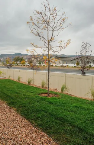 a view of a lake with houses in the back