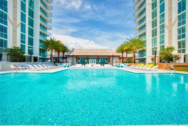 a view of a building with a yard