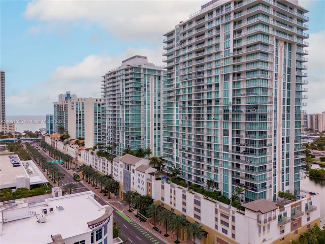 a view of a city with tall buildings