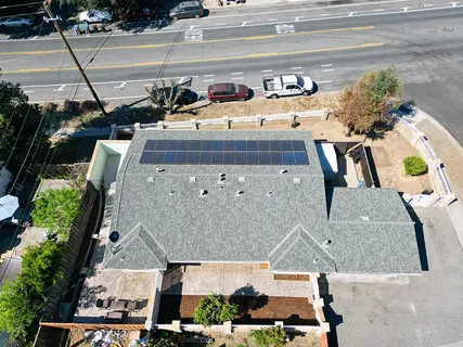 an aerial view of multiple houses with outdoor space