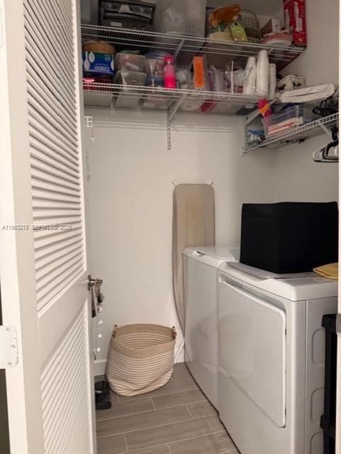 797 Bloomfield Road Port St. Lucie, FL 34984 - Photo 16 of 35 a utility room with dryer and washer