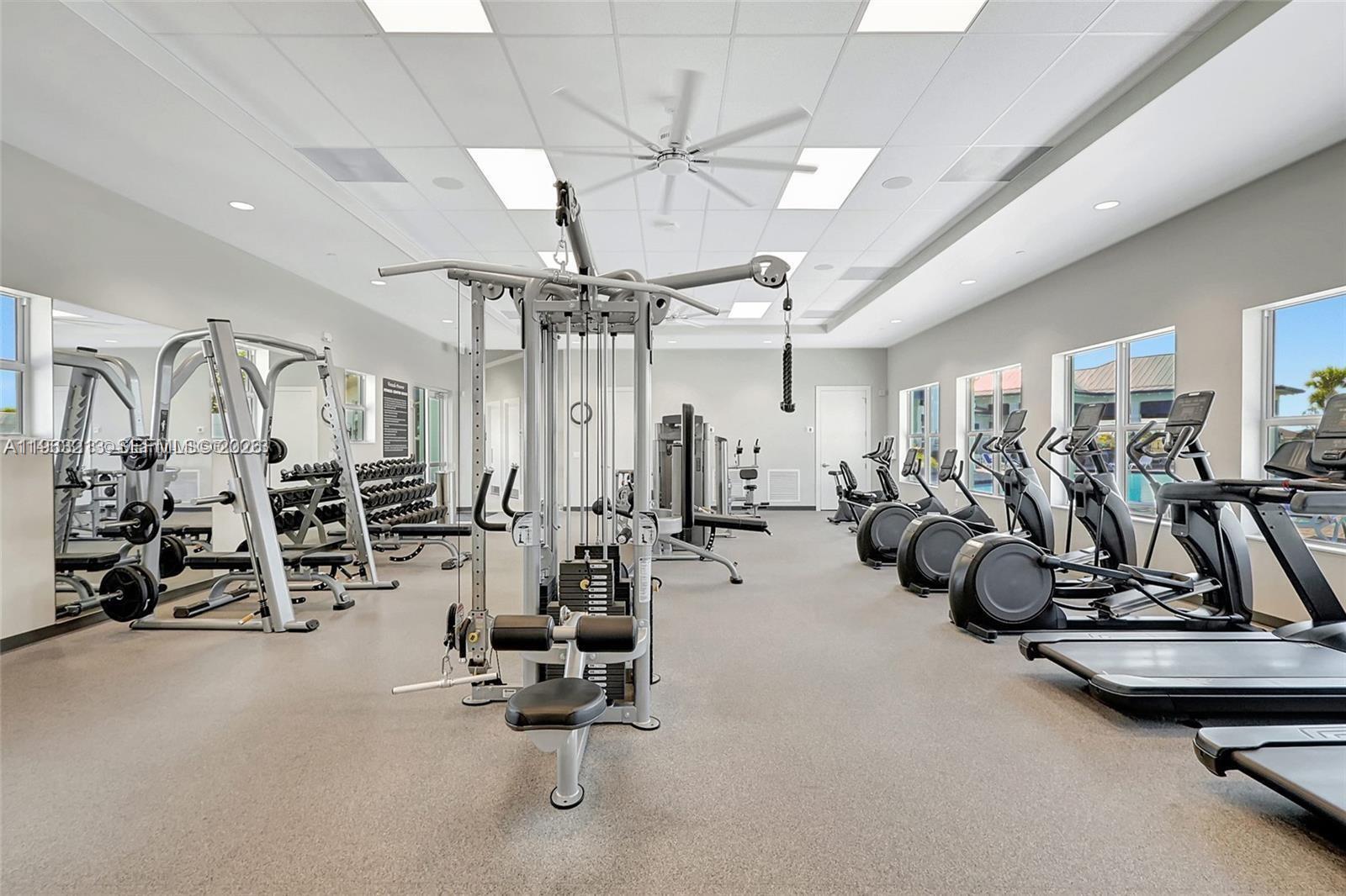797 Bloomfield Road Port St. Lucie, FL 34984 - Photo 22 of 35 a view of a room with gym equipment