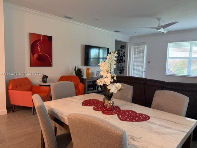 797 Bloomfield Road Port St. Lucie, FL 34984 - Photo 32 of 35 a living room with furniture and wooden floor