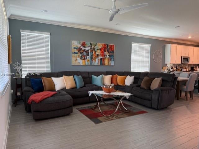 797 Bloomfield Road Port St. Lucie, FL 34984 - Photo 7 of 35 a living room with furniture a rug and a window