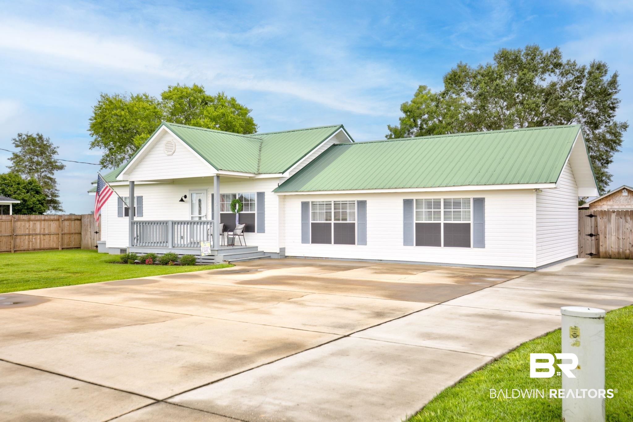 18732 Fairground Road Robertsdale, AL 36567 - Photo 2 of 46 View of front of property with a front yard