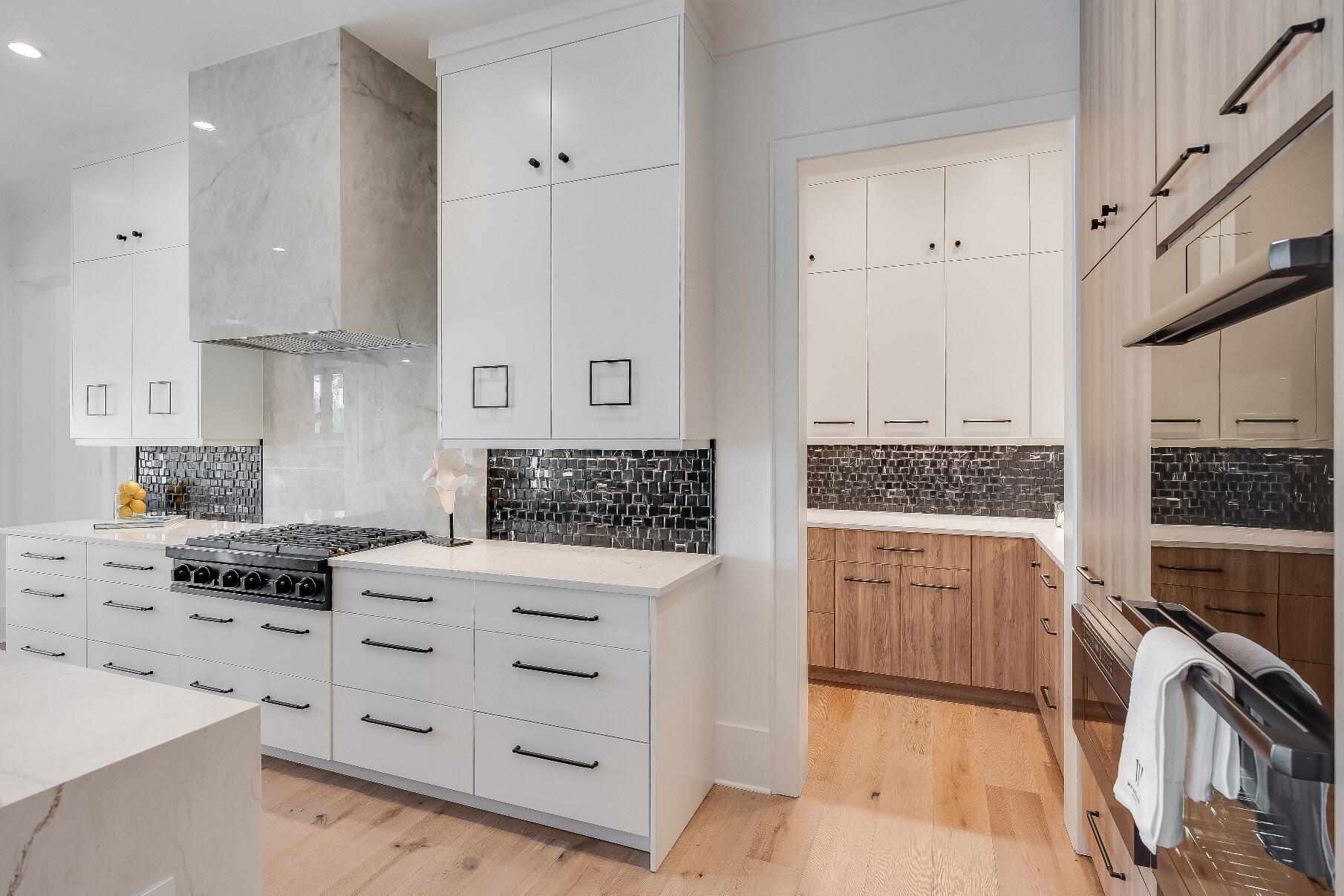 83 Norman Ct Inlet Beach Inlet Beach, FL 32461 - Photo 11 of 21 a kitchen with stainless steel appliances granite countertop a stove and a sink