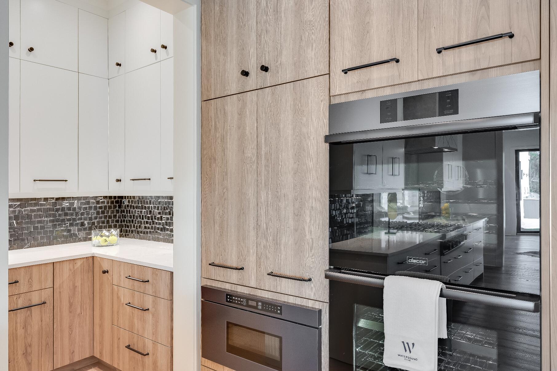 83 Norman Ct Inlet Beach Inlet Beach, FL 32461 - Photo 12 of 21 a kitchen with a sink and cabinets