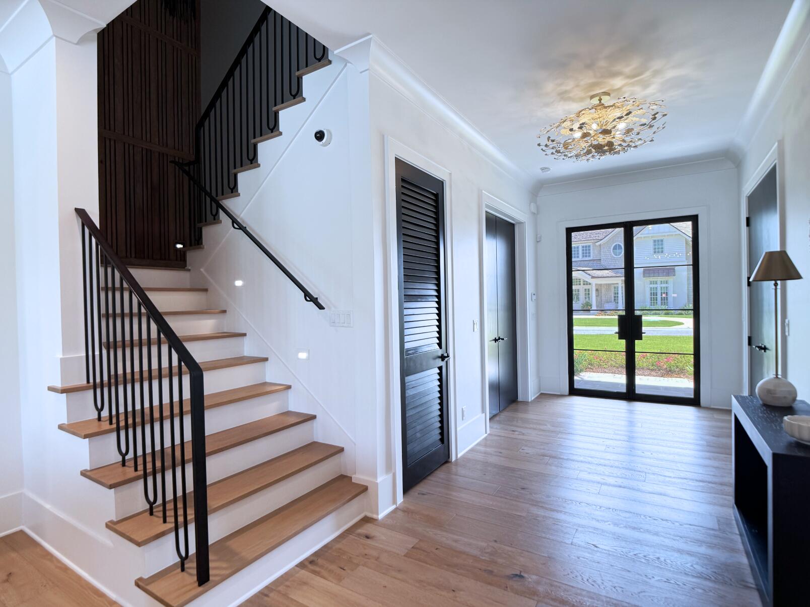 83 Norman Ct Inlet Beach Inlet Beach, FL 32461 - Photo 13 of 21 a view of a hallway with wooden floor and entryway