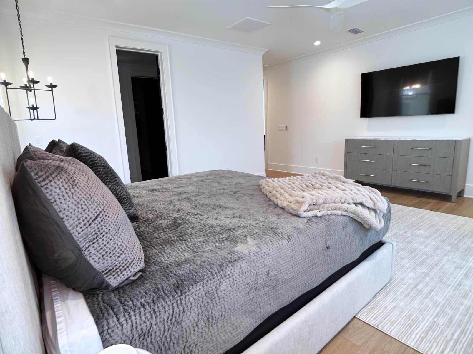 83 Norman Ct Inlet Beach Inlet Beach, FL 32461 - Photo 17 of 21 a bedroom with a bed and a flat screen tv