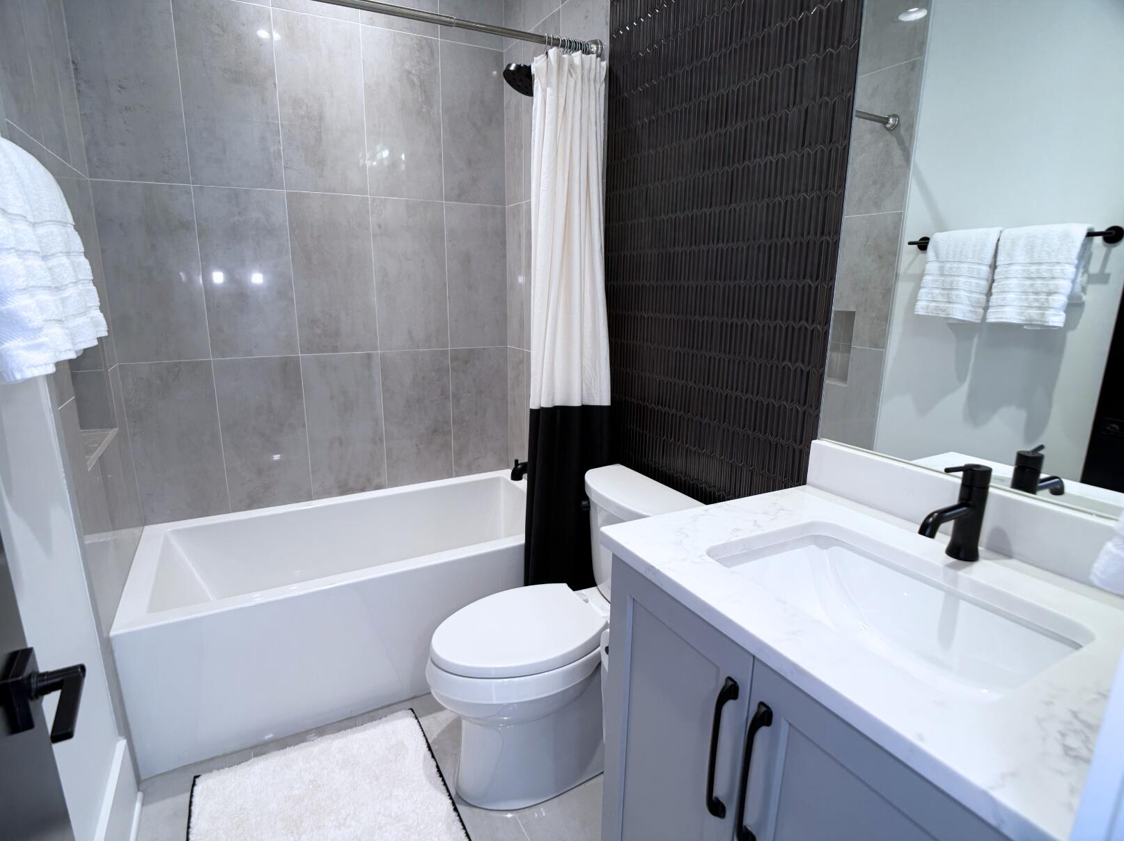 83 Norman Ct Inlet Beach Inlet Beach, FL 32461 - Photo 19 of 21 a bathroom with a sink a toilet and bathtub