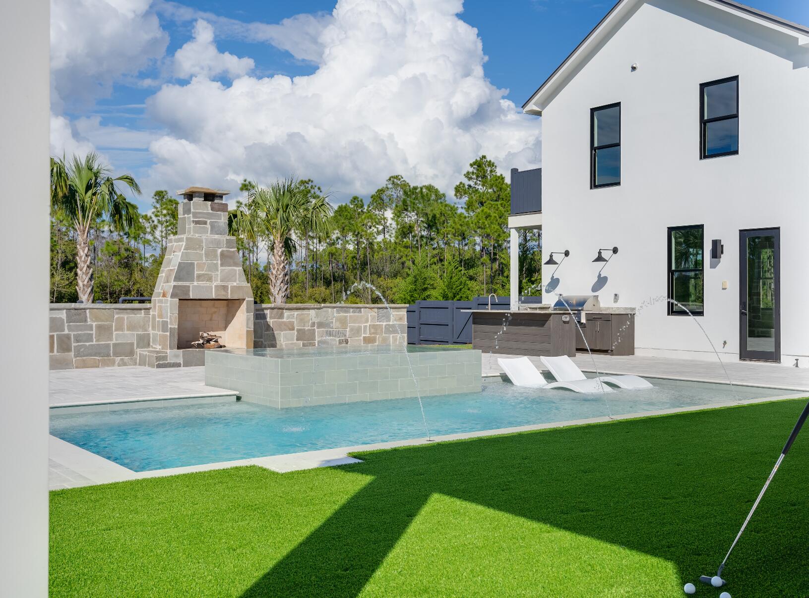 83 Norman Ct Inlet Beach Inlet Beach, FL 32461 - Photo 2 of 21 a view of a house with backyard sitting area and garden
