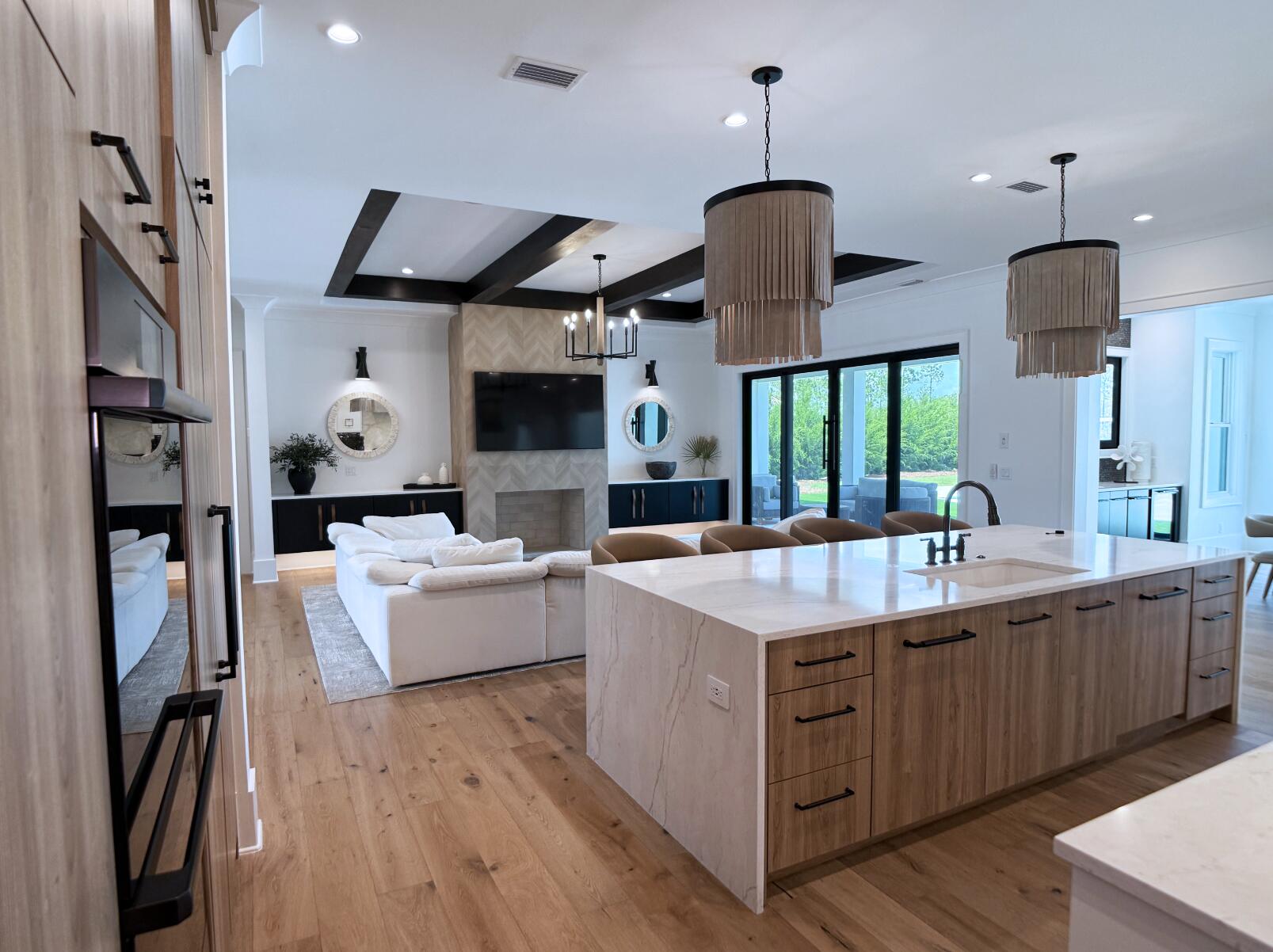 83 Norman Ct Inlet Beach Inlet Beach, FL 32461 - Photo 6 of 21 a kitchen with cabinets a sink and a stove