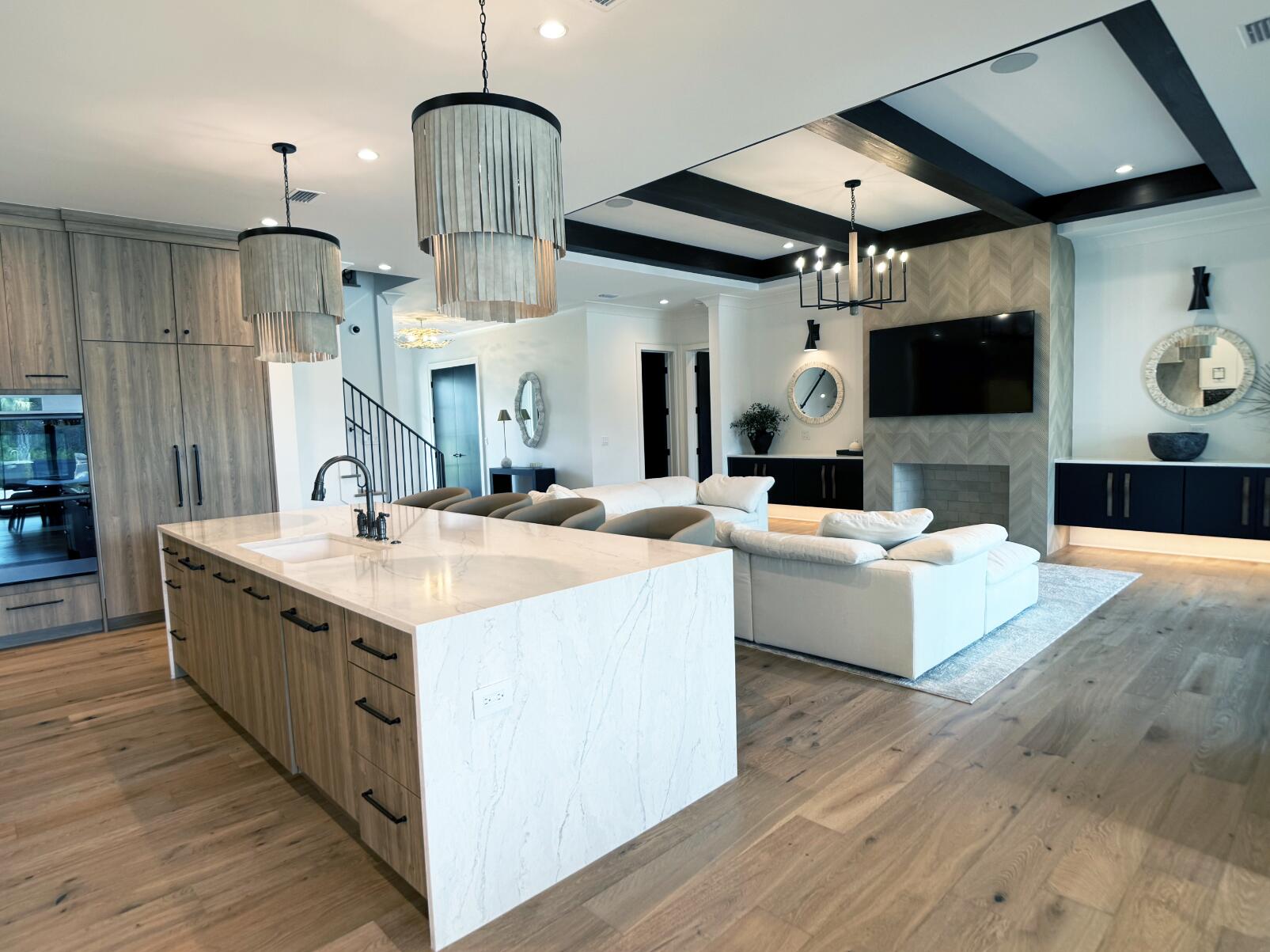 83 Norman Ct Inlet Beach Inlet Beach, FL 32461 - Photo 8 of 21 a large kitchen with kitchen island a large island in the center