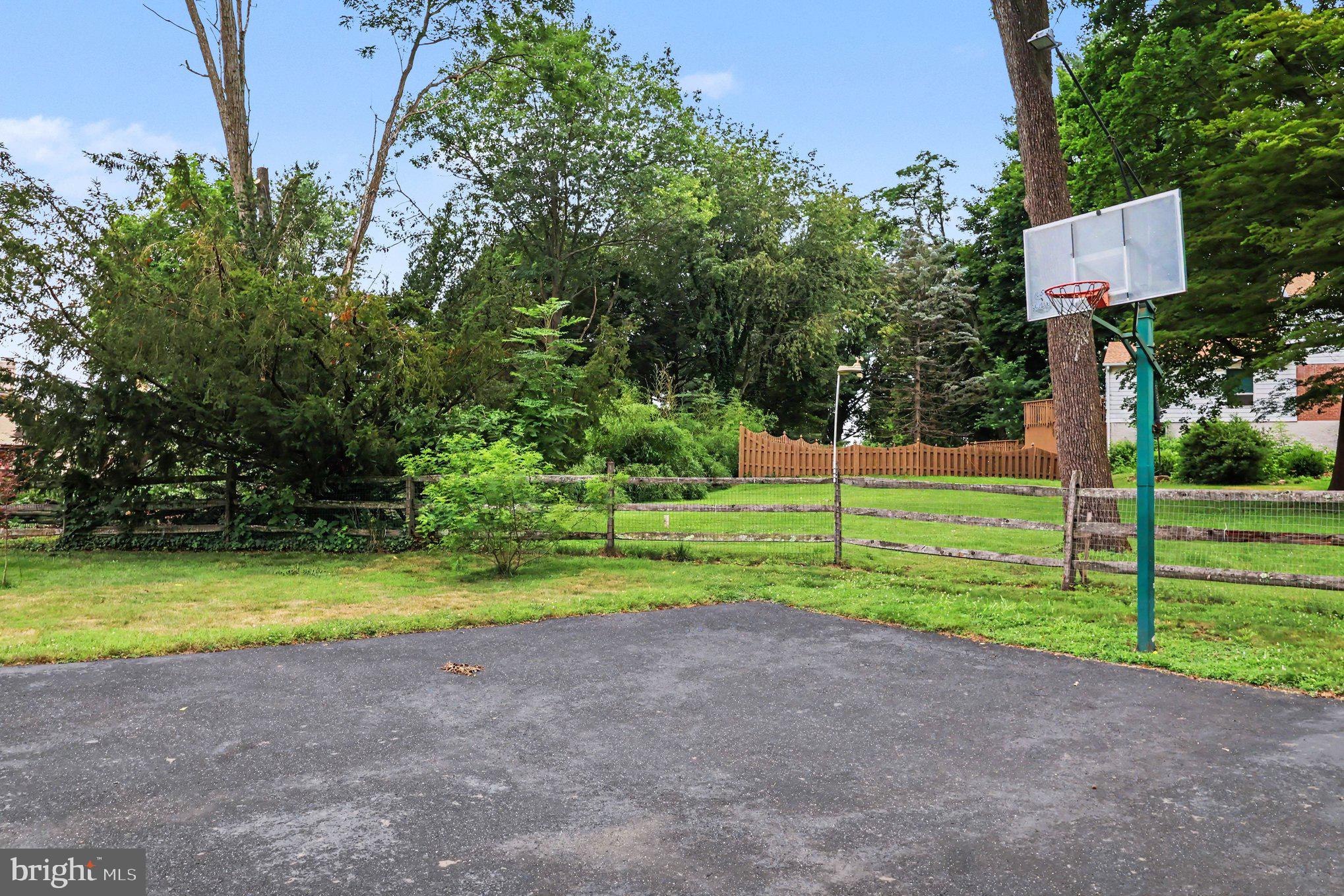25 East Knowlton Road Media, PA 19063 - Photo 65 of 73 Private backyard basketball court.