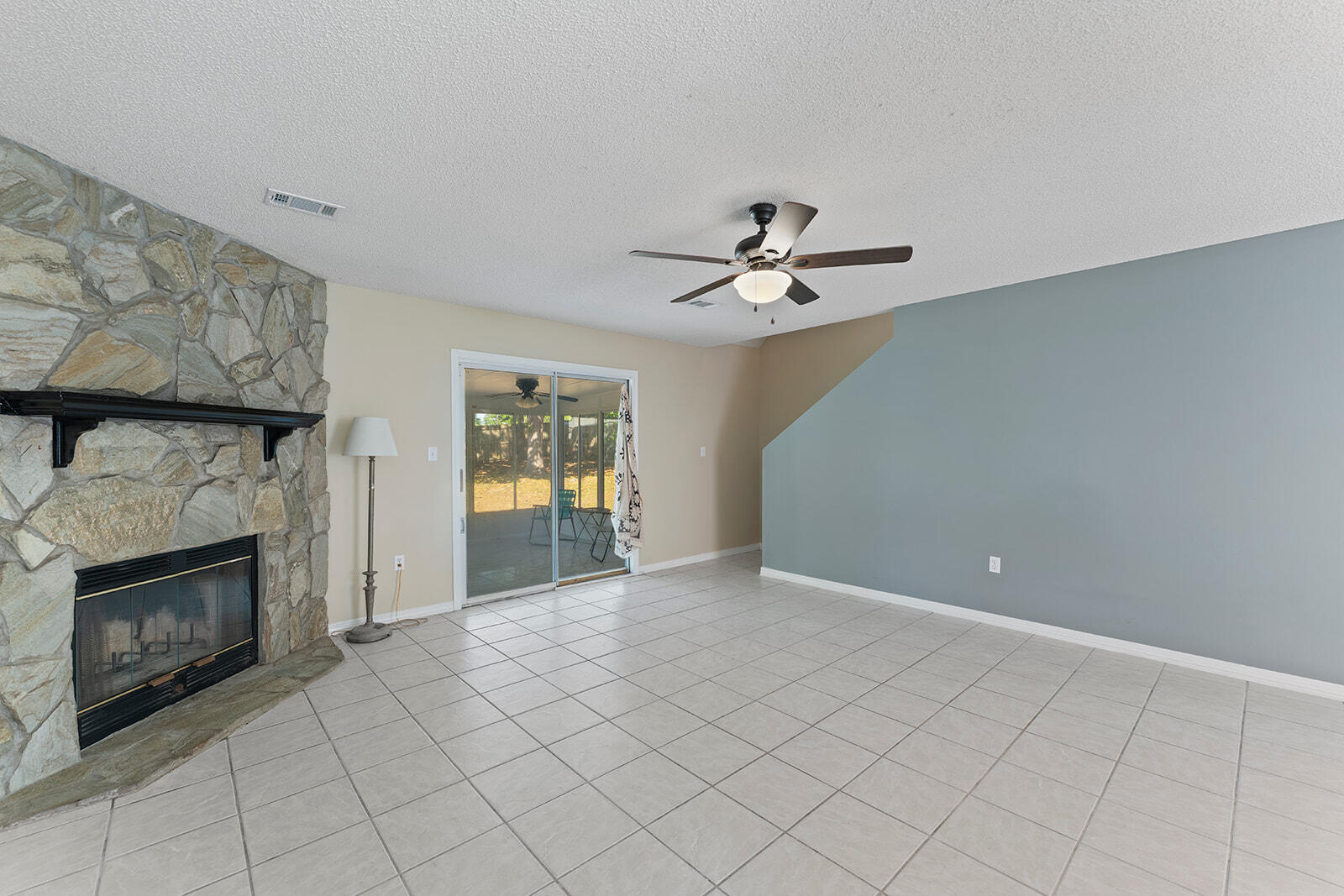 109 Nicole Lane Crestview, FL 32539 - Photo 15 of 60 a view of an empty room with window and fireplace