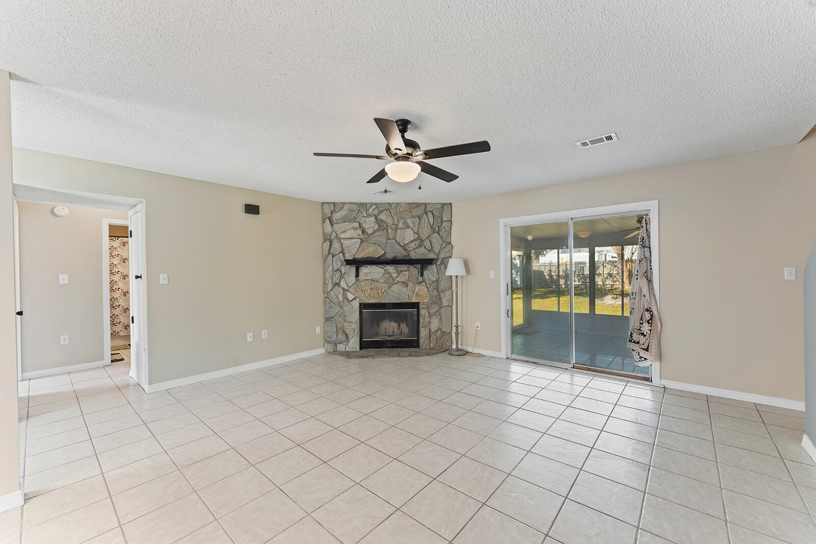 109 Nicole Lane Crestview, FL 32539 - Photo 16 of 60 a view of an empty room with a fireplace
